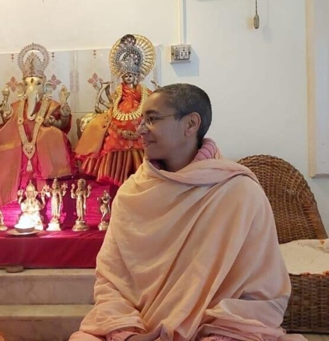 sitting in front of a shrine